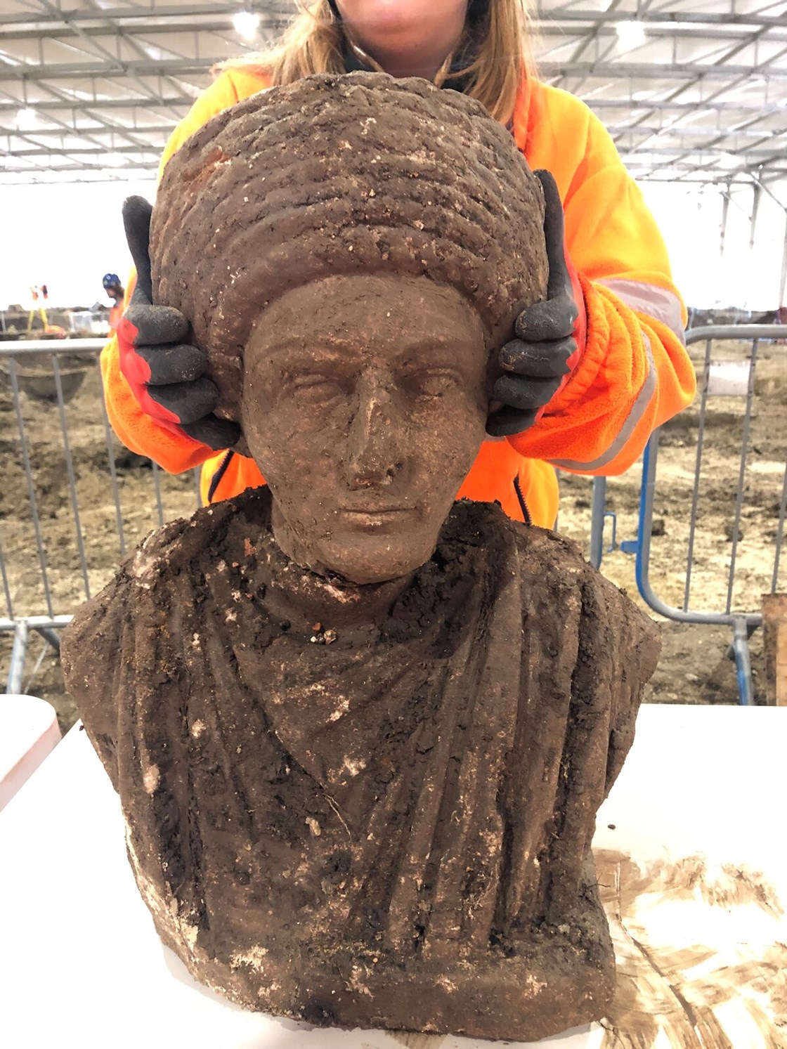 Complete female male Roman bust  - Artefacts from St Mary's Archaeological dig - Stoke Mandeville, Buckinghamshire-2: Complete bust of female Roman statue discovered during a HS2 archaeological dig at the site of old St Mary’s church in Stoke Mandeville, Buckinghamshire. The artefacts were found underneath the footprint of a Medieval church that was being excavated. 

Tags: Roman, Archaeology, Stoke Mandeville, Buckinghamshire