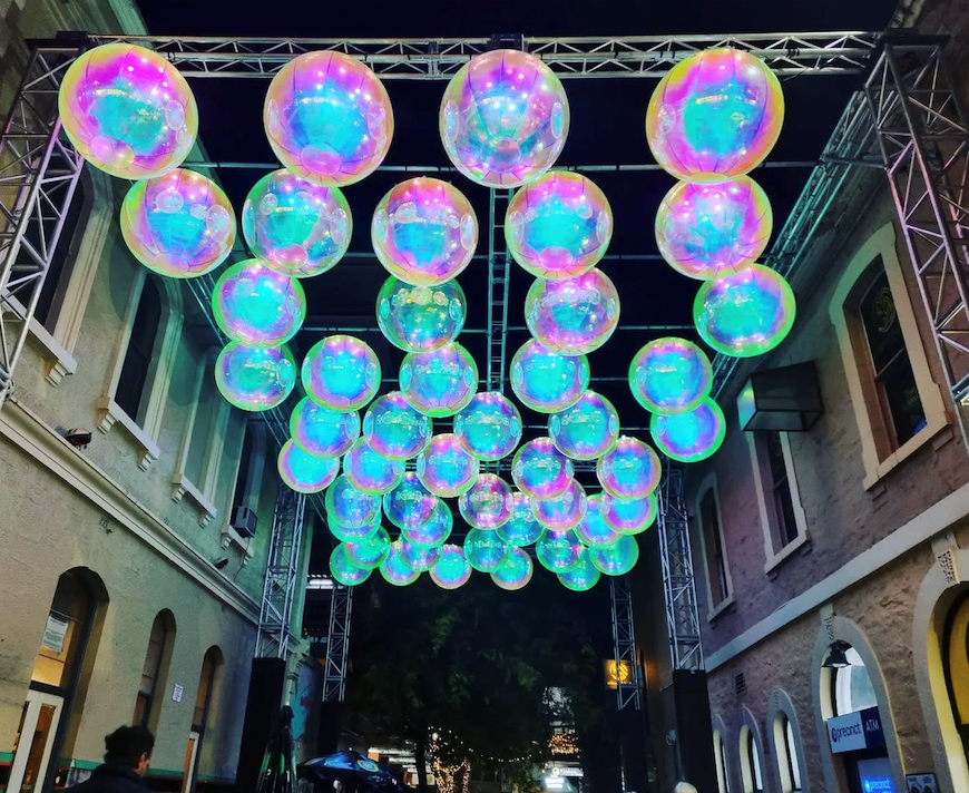 Light Night 2023: The impressive Evanescent, hosted by Leeds Dock and The Royal Armouries, which has been created by Australian design studio Atelier Sisu.
Standing more than eight metres tall, the remarkable artwork will give visitors the chance to walk amongst a series of large, illuminated and colourful bubbles accompanied by a spellbinding soundscape.