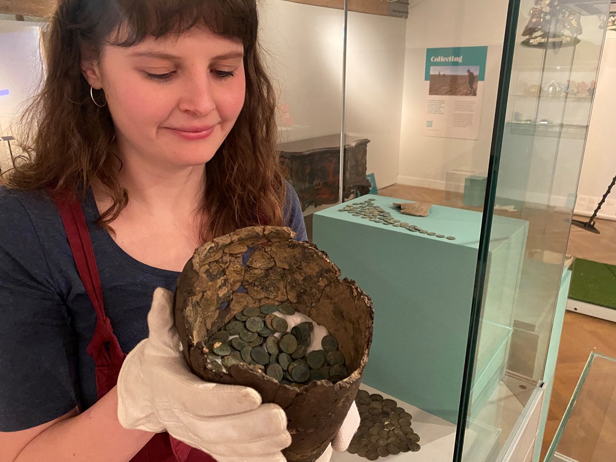 Money Talks hoards: Rachael Dilley, Leeds City Museum's curator of exhibitions, with the Cridling Stubbs Hoard, a remarkable stockpile of copper coins which may have been concealed by the owner inside a large jar in around AD 346 in a bid to keep the riches inside safe from Saxon and Irish raiders.