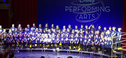 Milford Haven Community School pupils on stage at Disneyland Paris