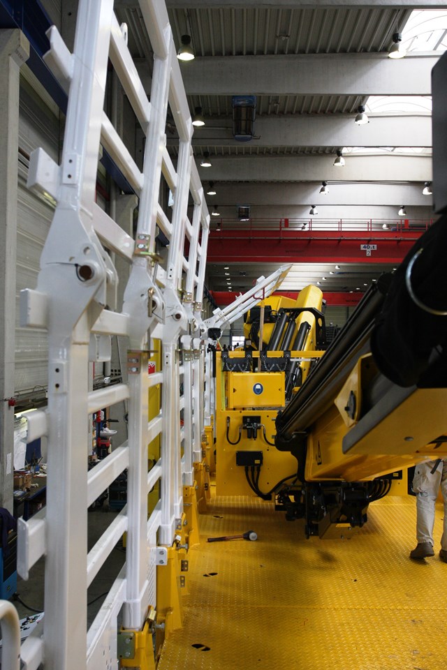 The steel safety 'wall' on the HOPS to allow adjacent line working at speed: The steel safety 'wall' on the HOPS to allow adjacent line working at speed. Pictured at the Windhoff plant in Rheine, Germany