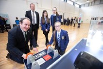 Energy Minister Paul Wheelhouse with pupils from Larbert High 2