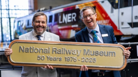Andrew McLean, NRM, and David Horne, Managing Director of LNER hold a new nameplate