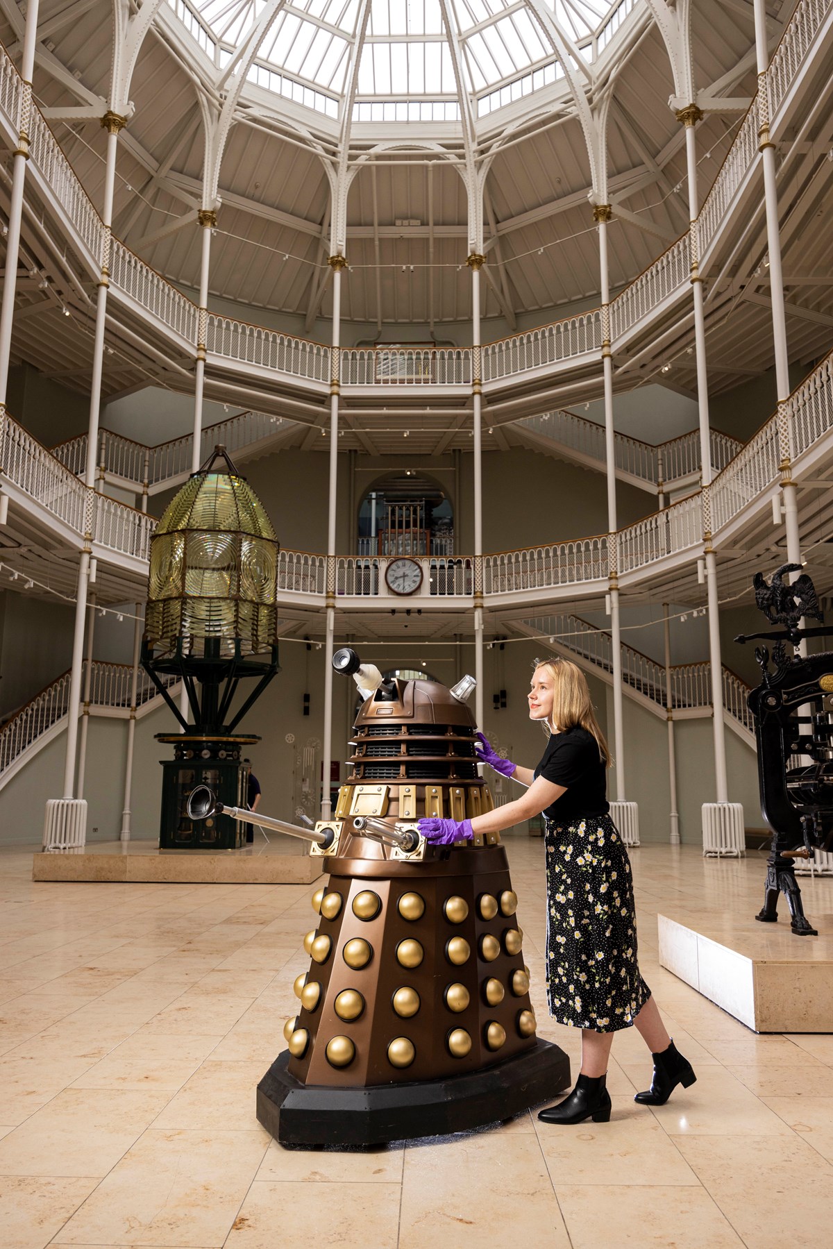 Liv Mullen wheels a Dalek into the National Museum of Scotland ahead of major exhibition. Photo credit © Duncan McGlynn (2)
