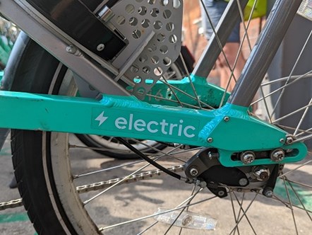 Close up of the electric symbol on the lower frame of a Beryl e-bike
