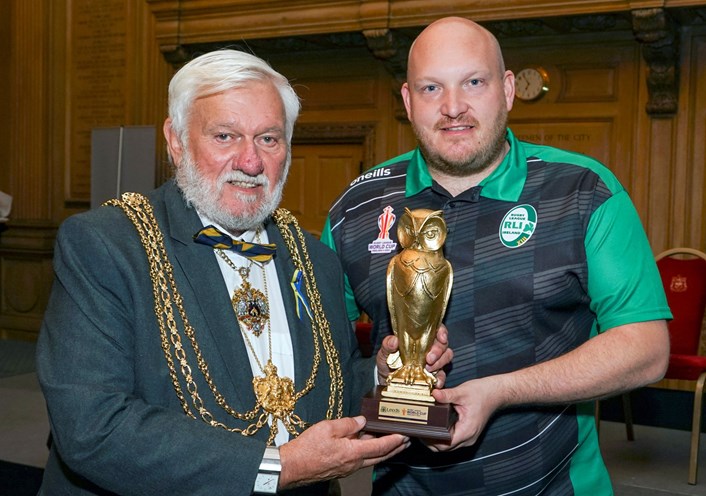 Civic reception 1: The Lord Mayor of Leeds, Councillor Robert W Gettings MBE JP, presents a welcome gift to Adam Bates, Irish team manager.