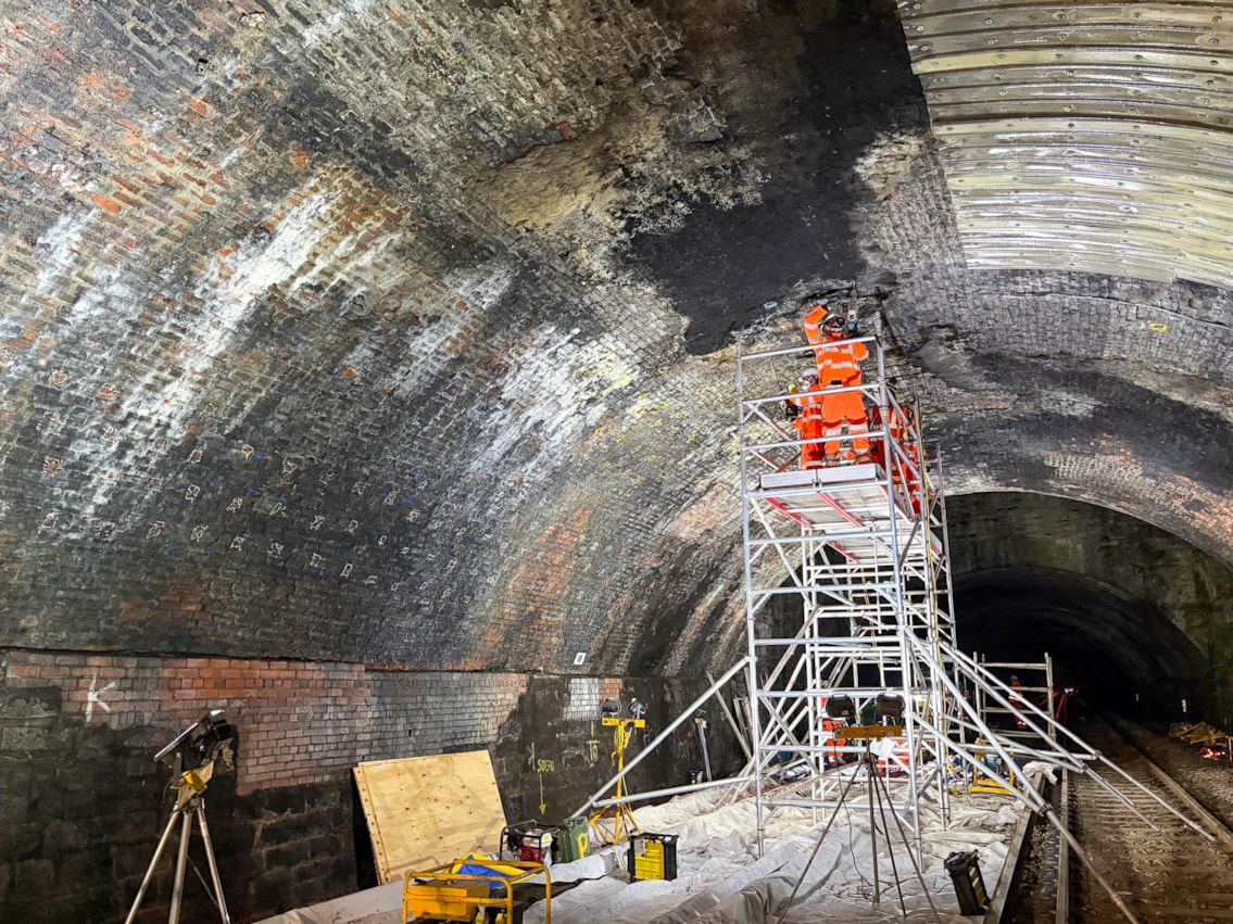 Wide shot of colleagues working inside St James Tunnel