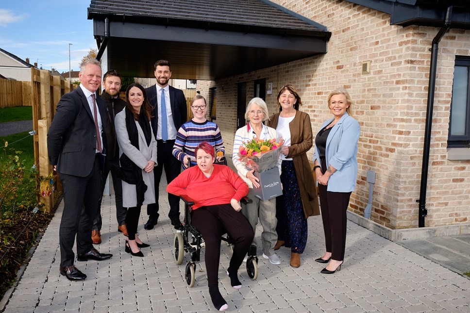 Miss Beaton with daughters Donna and Sandra with Cllrs Clare Maitland and Elaine Stewart, Blair Millar, Gary Craig and Lisa Punton from Housing and Communities and Chris Murray from CCG at Mill O'Shield Road, Drongan