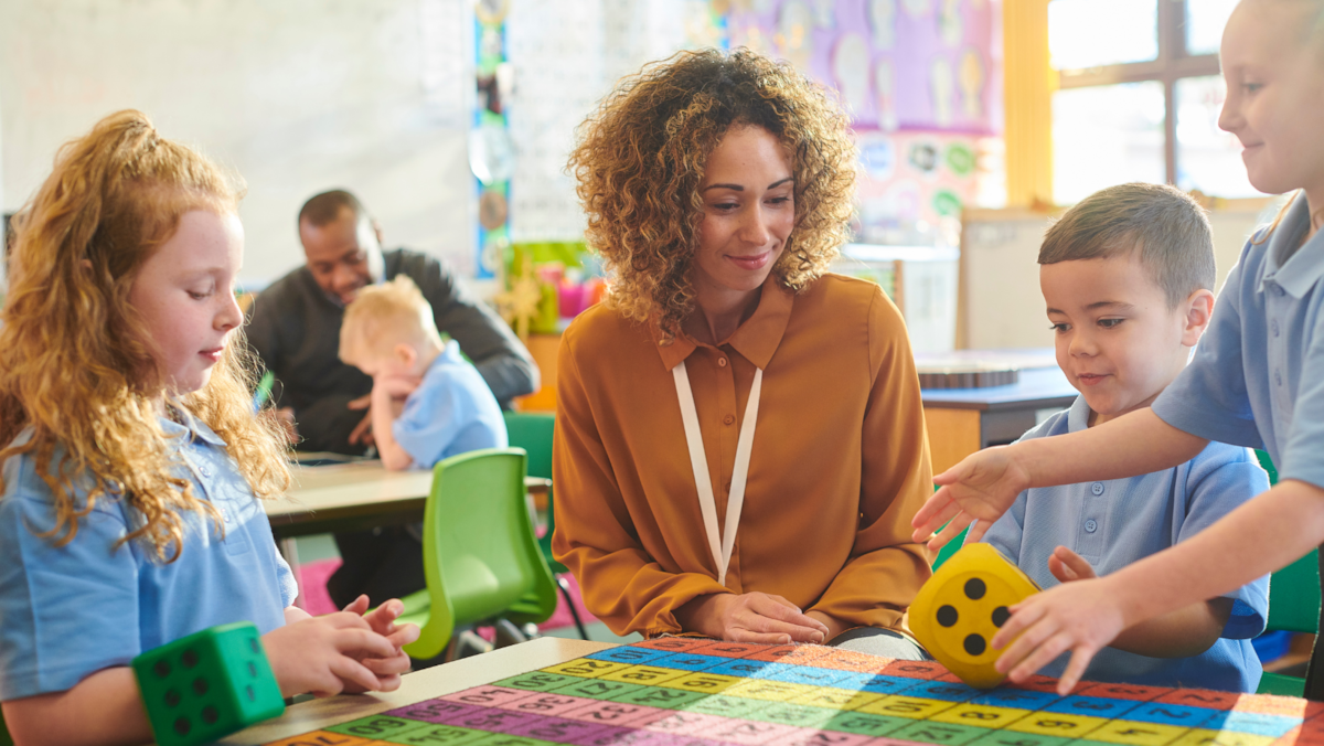 An ELC setting where the teacher and children can be seen interacting with each other.