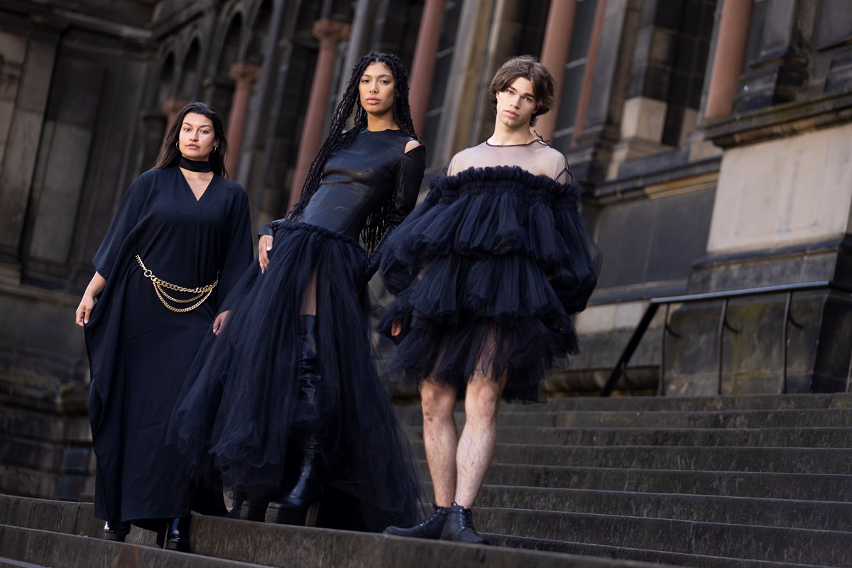 Models (L-R) Shannon Summers, Grace Dempsey and Joshua Cairns arrive at the National Museum of Scotland ahead of the opening of Beyond the Little Black Dress on  Saturday (1 July). The exhibition deconstructs an iconic wardrobe staple, examining the radical power of the colour black in fashion. Image copyright Duncan McGlynn.