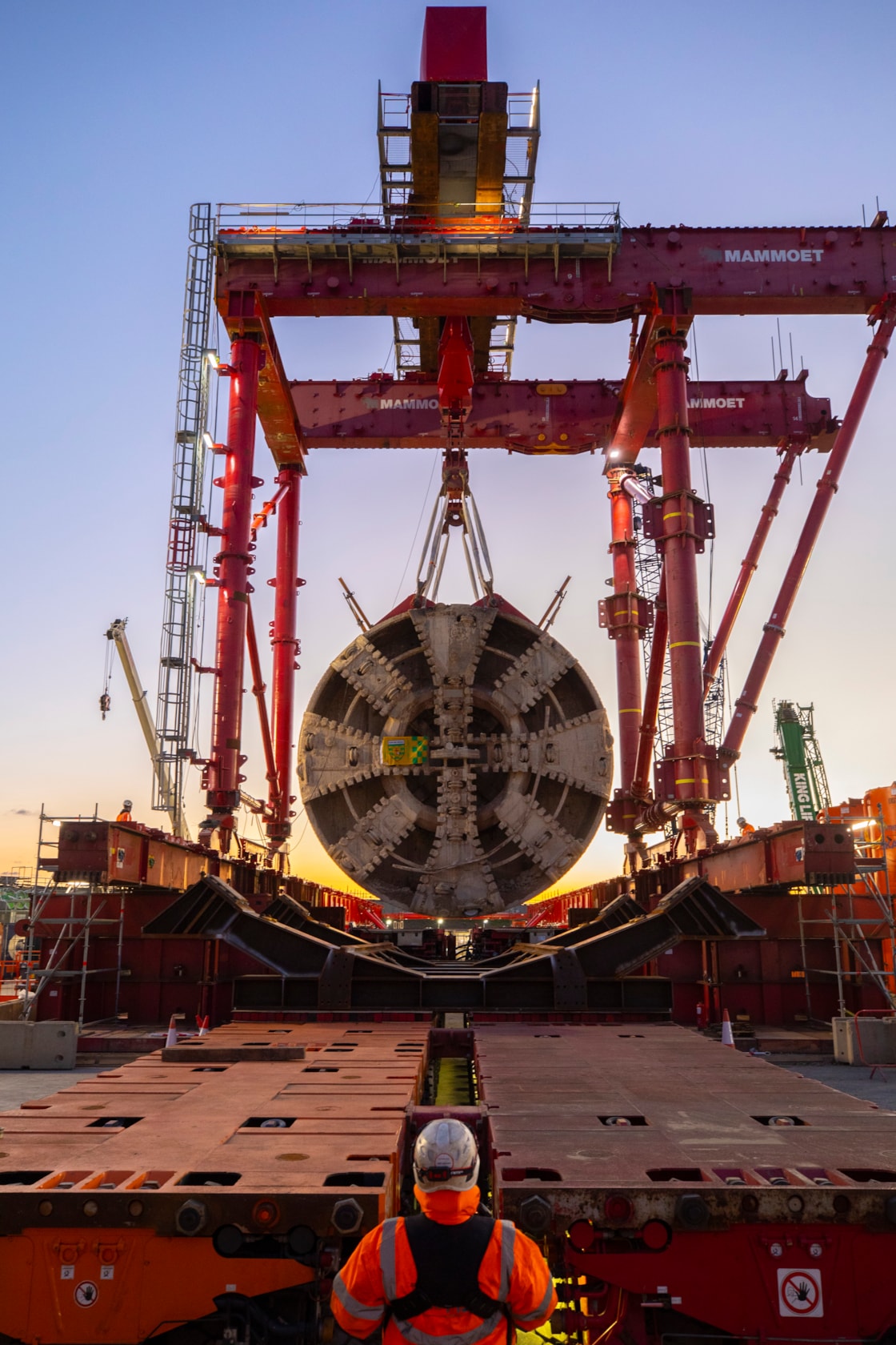 TBM Sushila removed after completing 5-mile journey to construct HS2's Northolt Tunnel under the capital-7: Following its 5-mile drive underneath the capital, HS2 lifted Tunnel Boring Machine (TBM) ‘Sushila’ out of the ground at the Green Park Way site in Greenford, West London.
 
The cutterhead, front and middle shield, weighting 880 tonnes, were lifted from the vent shaft in one piece on Saturday, March 15, using a 750 tonne gantry crane. The TBM – with a cutterhead spanning 9.48 metres in diameter – was launched from West Ruislip in October 2022 and completed its journey in December 2024. TBM Sushila excavated over 1.2 million tonnes of earth and installed 4,217 tunnel rings.
 
TBM Sushila was used to construct part of the Northolt Tunnel – an 8.4-mile tunnel being built by four TBMs which will take HS2 trains from Old Oak Common Station to the outskirts of the capital.

Copyright - HS2 Ltd