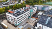 Wester Hailes HS overhead external view: An overhead external view of the new Wester Hailes High School building, showing the site's setting next to the Union Canal.