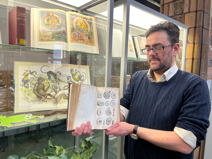 Antique book return: Special collections librarian Antony Ramm with one of pair of antique library books written by a renowned 19th century geologist which have finally been returned 50 years late.
Volumes I and II of the esteemed Rev. William Buckland’s Geology and Mineralogy, written almost 200 years ago, were due back at Leeds Central Library in March 1976, but were instead discovered by staff in a charity shop in Beverley, East Yorkshire.