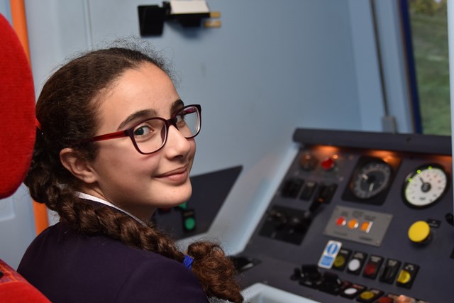Zalihe tries her hand at driving a train using Network Rail's driver simulator