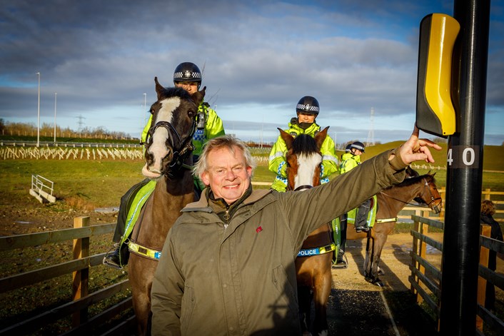 Martin Clunes pressing equestrian crossing button on East Leeds Orbital Route: The President of The British Horse Society, Martin Clunes presses the crossing button on one of the 6 equestrian crossings on ELOR.