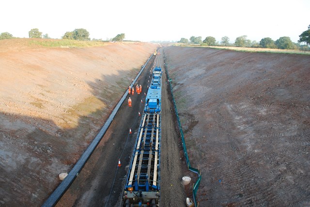 Track-laying machine heading north from bridge three at Norton Bridge