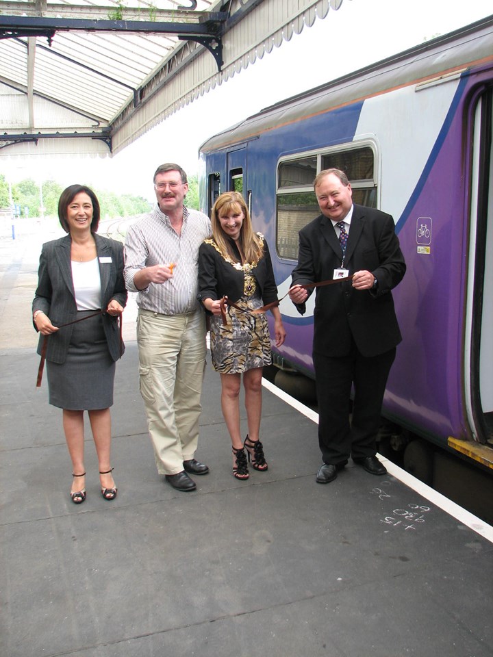 Northwich platform hump: A ribbon is cut to mark the official opening of the platform hump.
l-r Natasha Wilding, Northern Rail head of stations - area west; Cllr Mike Jones, leader Cheshire West & Chester Council; Cllr Alison Gerrard, Northwich Town Mayor; Jon Kelly, Network Rail scheme sponsor.