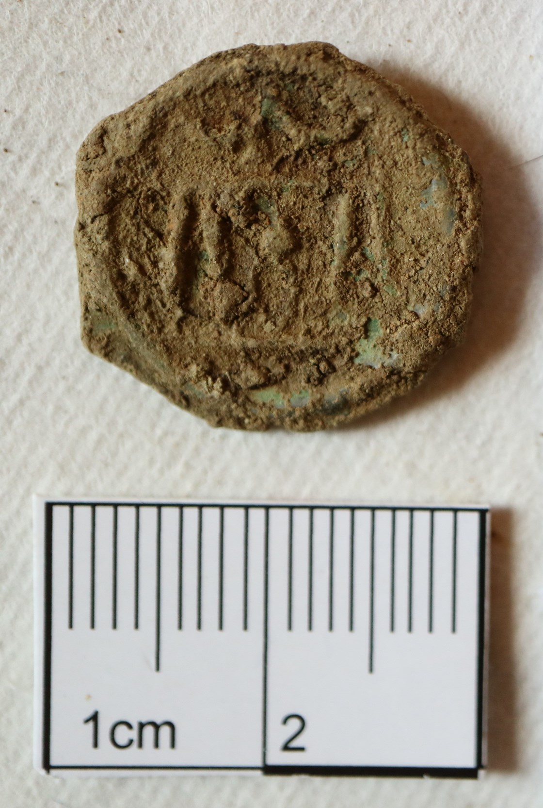 Hillingdon Hoard - Potin Before Conservation (1): A potin found in Hillingdon, as part of a collection now termed the Hillingdon Hoard before cleaning.

Tags: Archaeology, London, Hillingdon, Iron Age