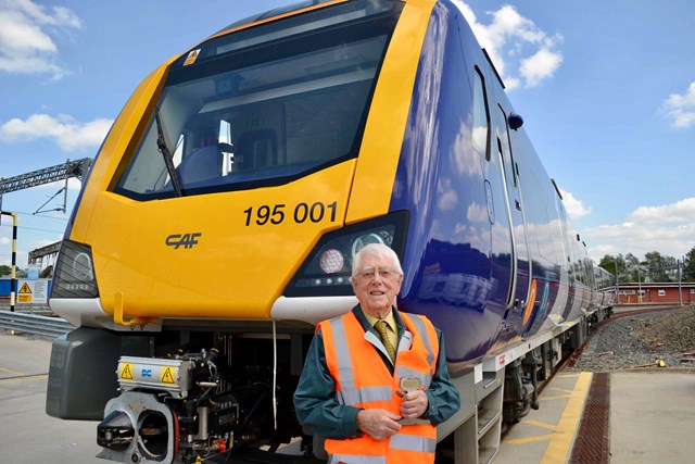 Former station master made VIP guest to celebrate 70 years since joining railway: Russell Parsons in front of new Northern CAF train