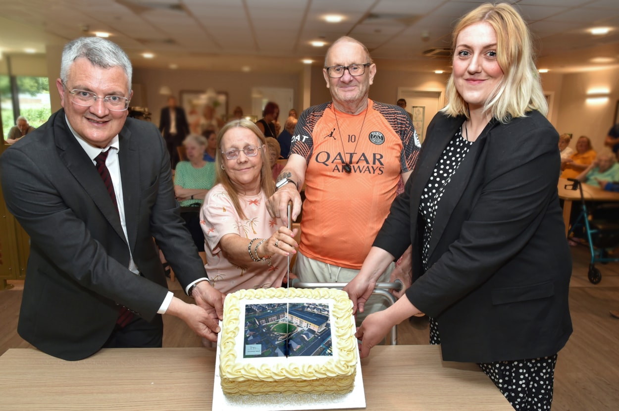 Gascoigne 2: Councillor James Lewis and Councillor Jess Lennox help Rosemary and Steven Brown with the cutting of a celebratory cake at the Gascoigne House opening event.