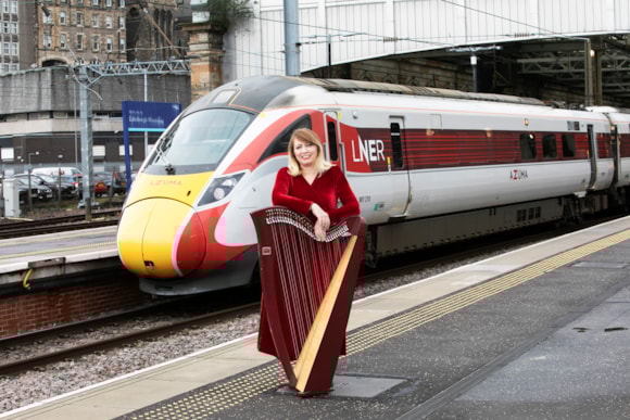 Linlithgow String Orchestra composer Deborah Shaw besides an Azuma.