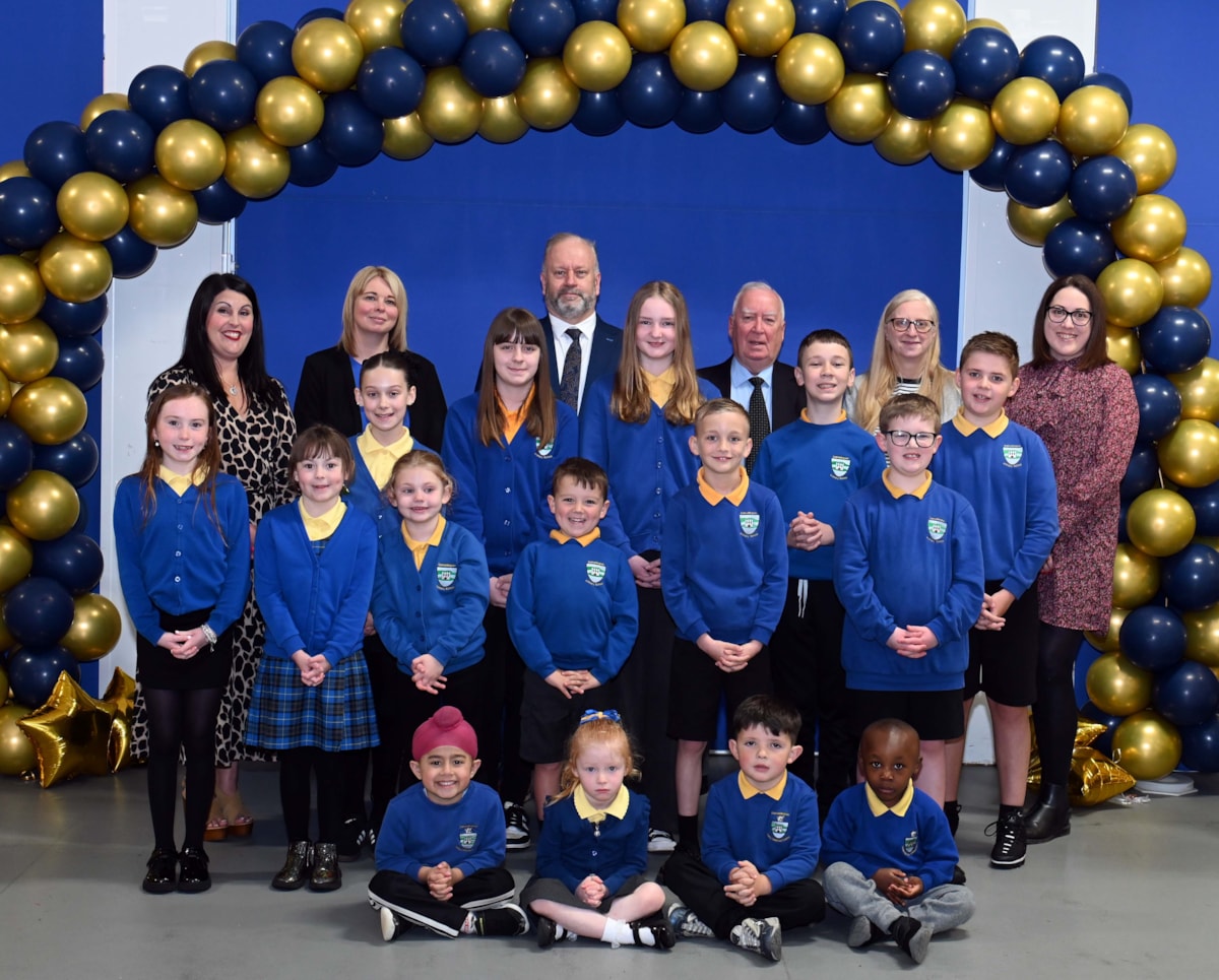 Dalmellington Primary School and ECC Headteacher Laura Clapperton (second left) leads the celebrations with Cllr Jim Kyle and Derek Forsyth