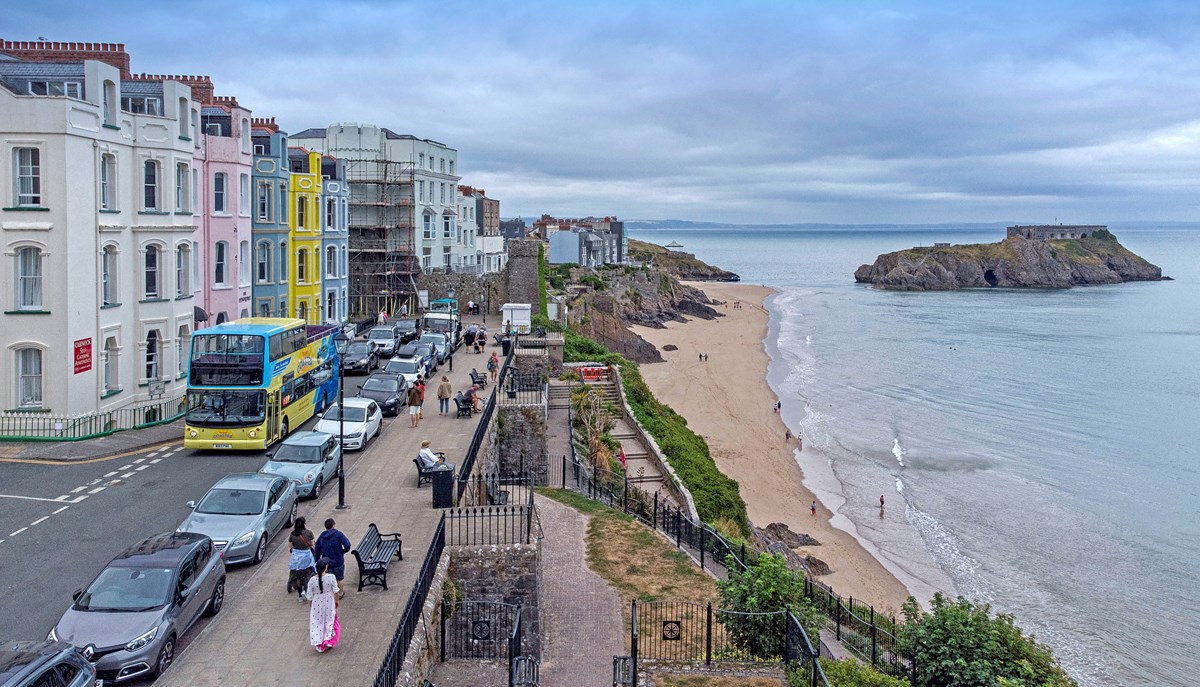 FirstCymru’s Tenby Coaster travels along the seafront on Tenby Esplanade.