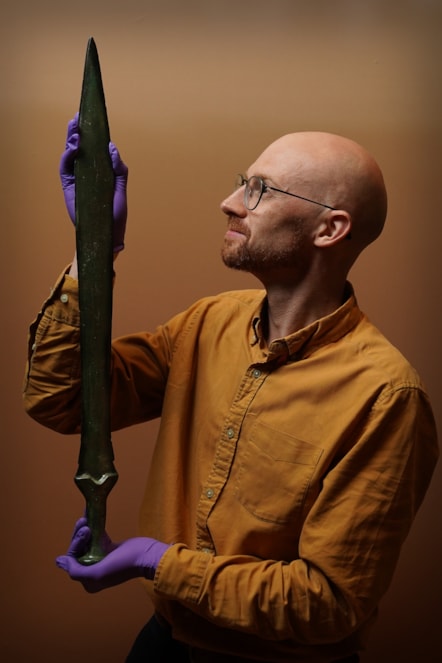 Dr Matthew Knight holds the Inverbroom sword. Photo (c) Stewart Attwood (2)