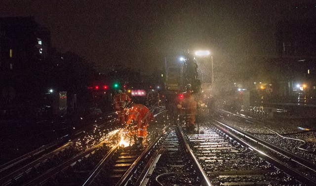 London Victoria - working in the rain