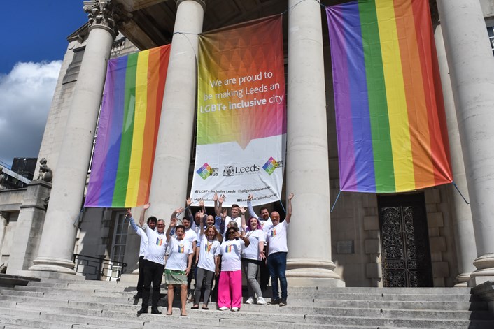 DSC 0277: Leader of Leeds City Council Cllr James Lewis and Executive Member for Communities, Cllr Mary Harland are joined by members of Leeds City Council’s LGBT+ staff network in front of the Civic Hall.