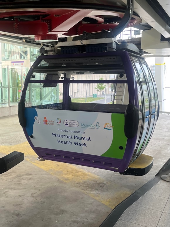 London Cable Car marks Maternal Mental Health Week with free event and specially wrapped cabin: TfL Image - London Cable Car gondola marking Maternal Mental Health Week
