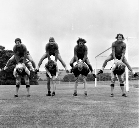 Burnley FC players Paul Fletcher, Mick Docherty, Eric Probert and Dave Thomas (top left to right) and Peter Mellor, Martin Dobson, Jim Thomson and an un-named player (bottom left to right) in training on July 14, 1971 at   Gawthorpe Training Ground, off Burnley Road, Padiham.