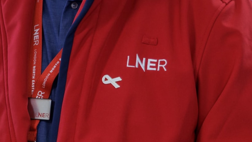 White Ribbon Ambassador badge on an LNER read coat