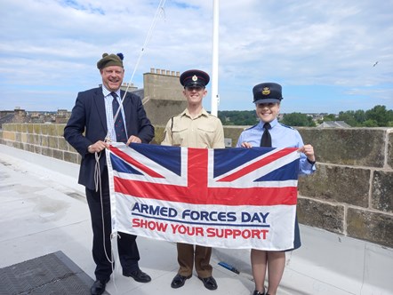 L-R Cllr Neil McLennan, Sergeant Johnpaul Johnstone, Pilot Officer Emily Moore