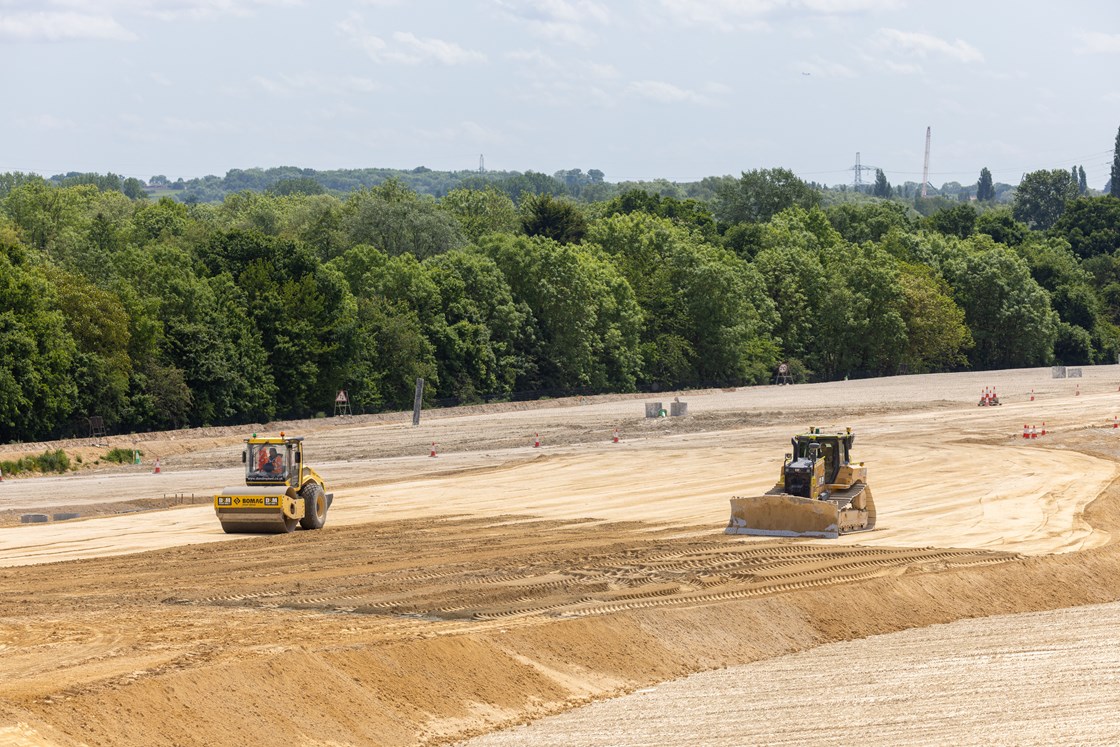 Bulldozer and roller spreading chalk near the south portal of the Chiltern tunnel - summer 2022