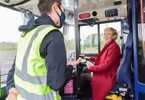 Baroness Vere driving bus