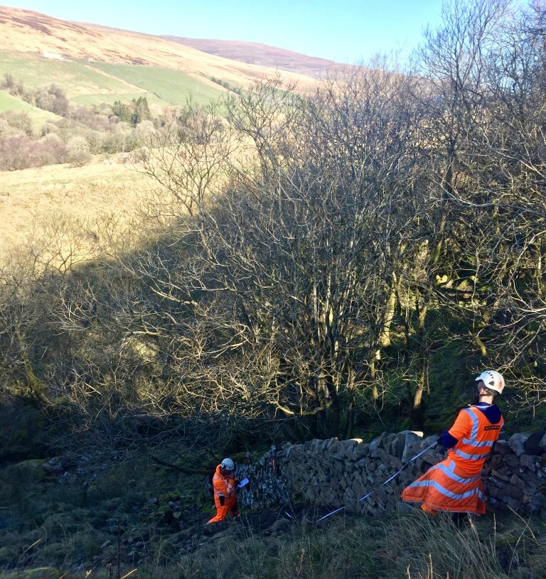 Repairs to dry-stone walls during the Cumbrian winter
