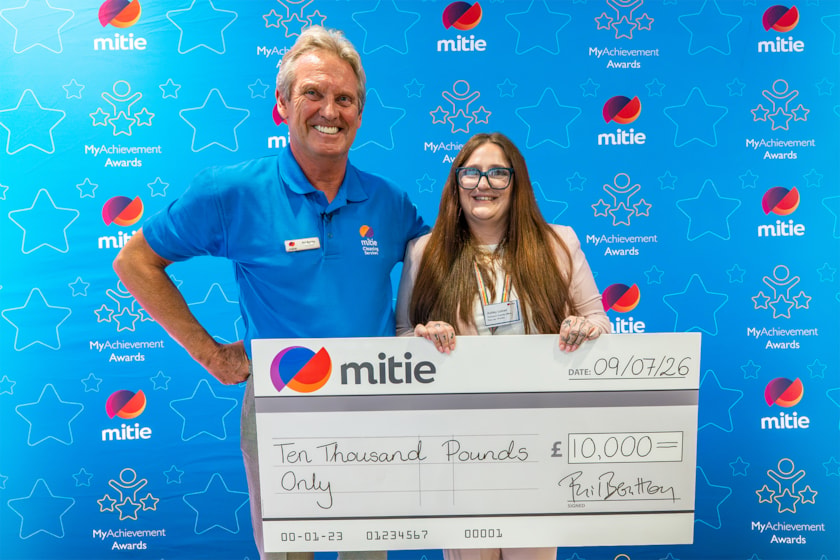 Phil Bentley with Ashley, Mitie Stars first place winner