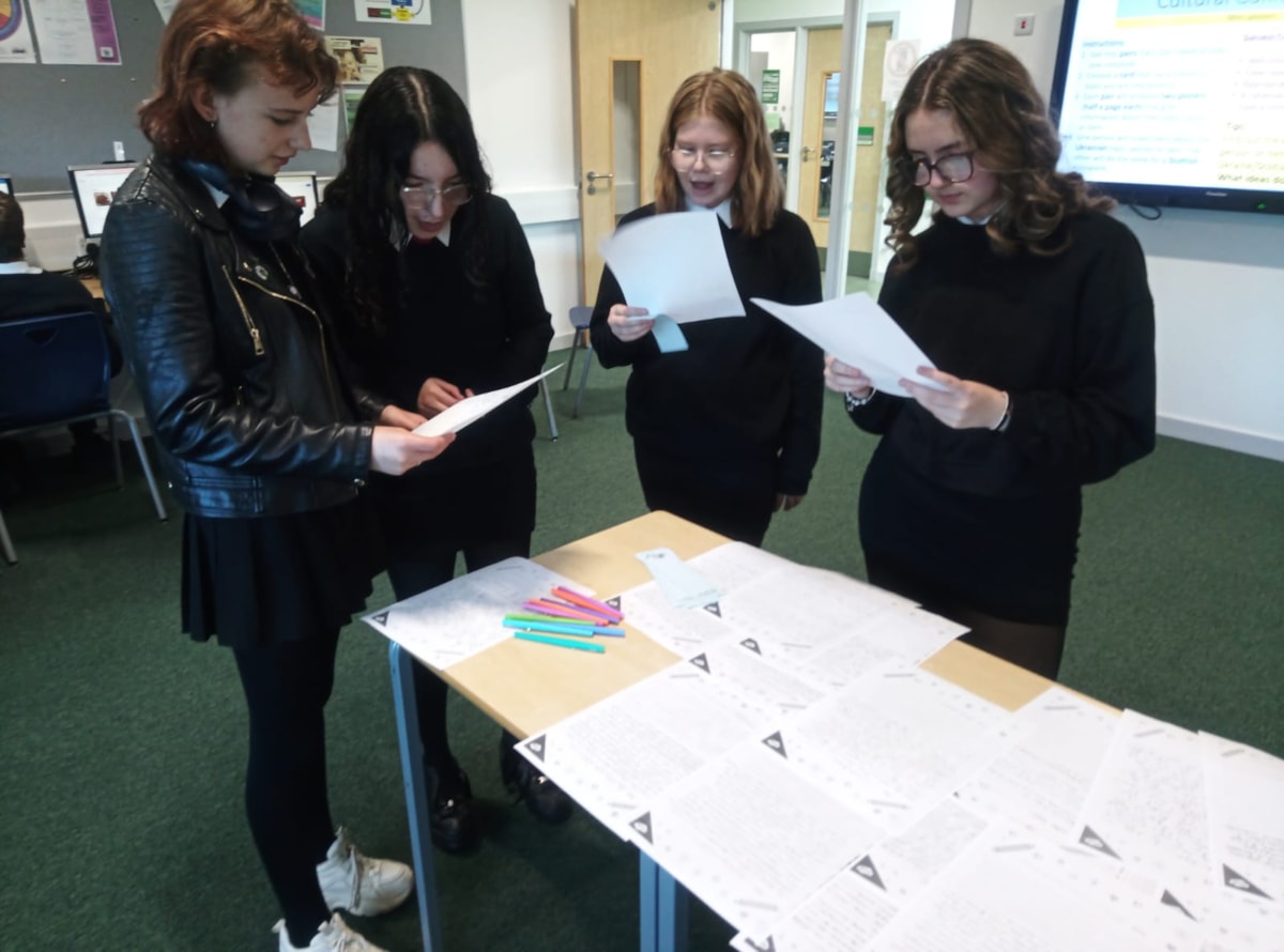 Elgin Academy pupils reading letters