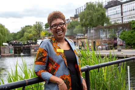 Fatma Makalo poses by the Regent's Canal, in the gardens of the Bridgeside Lodge Care Centre