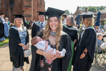 Shannon Holmes (centre) with baby Finley, alongside course-mates (L-R) Georgina Keighley-King, James Peacock, Nina Albertelli and Sharon Middlemore