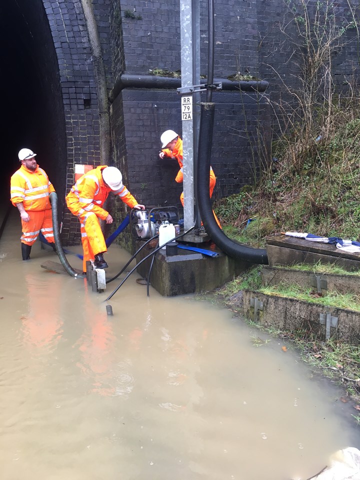 Flood water being pumped out of a railway tunnel on the West Coast main line near Crick