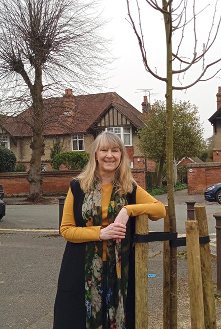 Cllr Karen Rowland on Downshire Square, west Reading, with one of the replacement lime trees added in 2020.