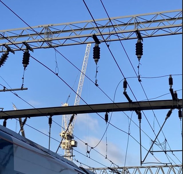 Overhead wires caught on a train pantograph at London Euston station