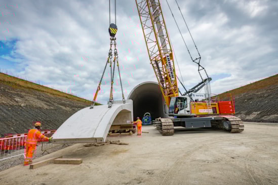 Side segment being lifted during assembly of the Chipping Warden green tunnel May 2023: Side segment being lifted during assembly of the Chipping Warden green tunnel May 2023