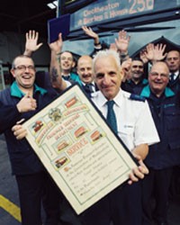 Arriva bus driver scores a century behind the wheel: Arriva bus driver, Russell Blackburn, holding the plaque he uncovered belonging to his great grandfather