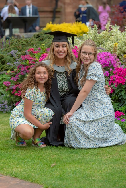 Spirit of Cumbria prize winner and Nursing Degree Apprentice Cherish Otoo celebrates graduation day with her daughters Isobella and Ava