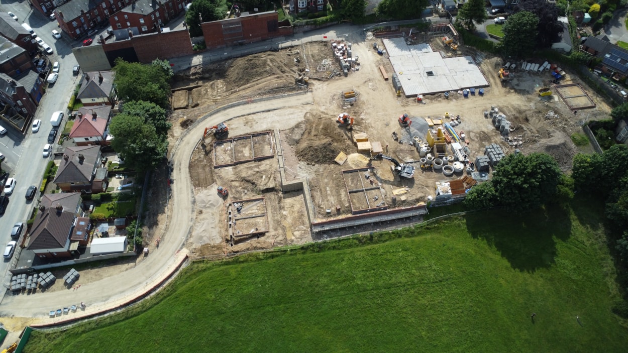 Armley 1: An aerial view of a new housing scheme currently taking shape at a site off Moorfield Road in Armley, Leeds. Credit: Termrim Construction.