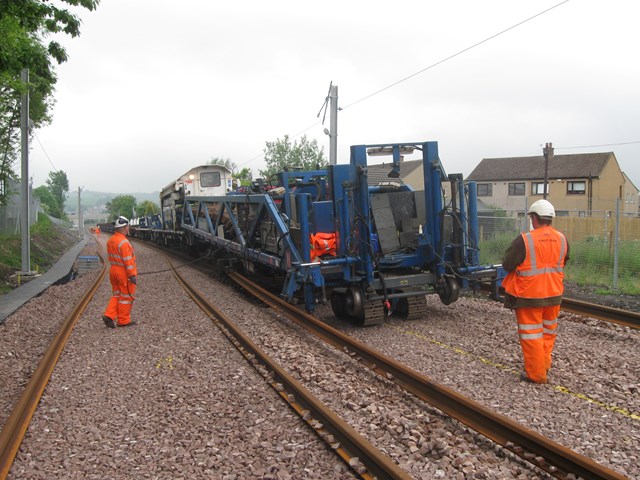 Track laying machine working on Airdrie-Bathgate line_2: The 200 tonne NTC track-laying machine has completed two tracks between Airdrie and Blackridge