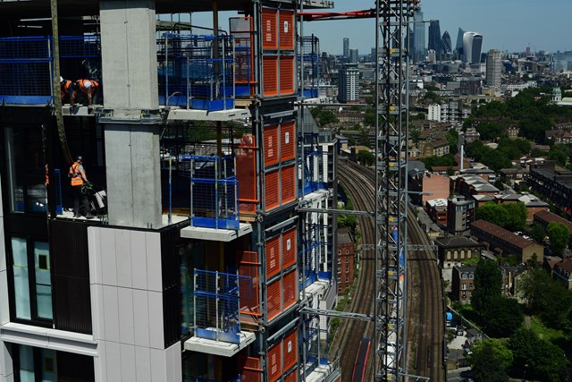 London apartments under construction by the railway - working at height
